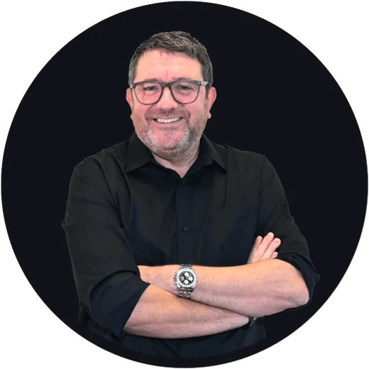 John Thornhill, named by the seller as the creator of the ClickBank Profit Club, smiling with arms crossed